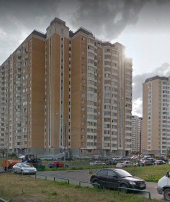 дом 11 на проспекте Защитников Москвы в Москве